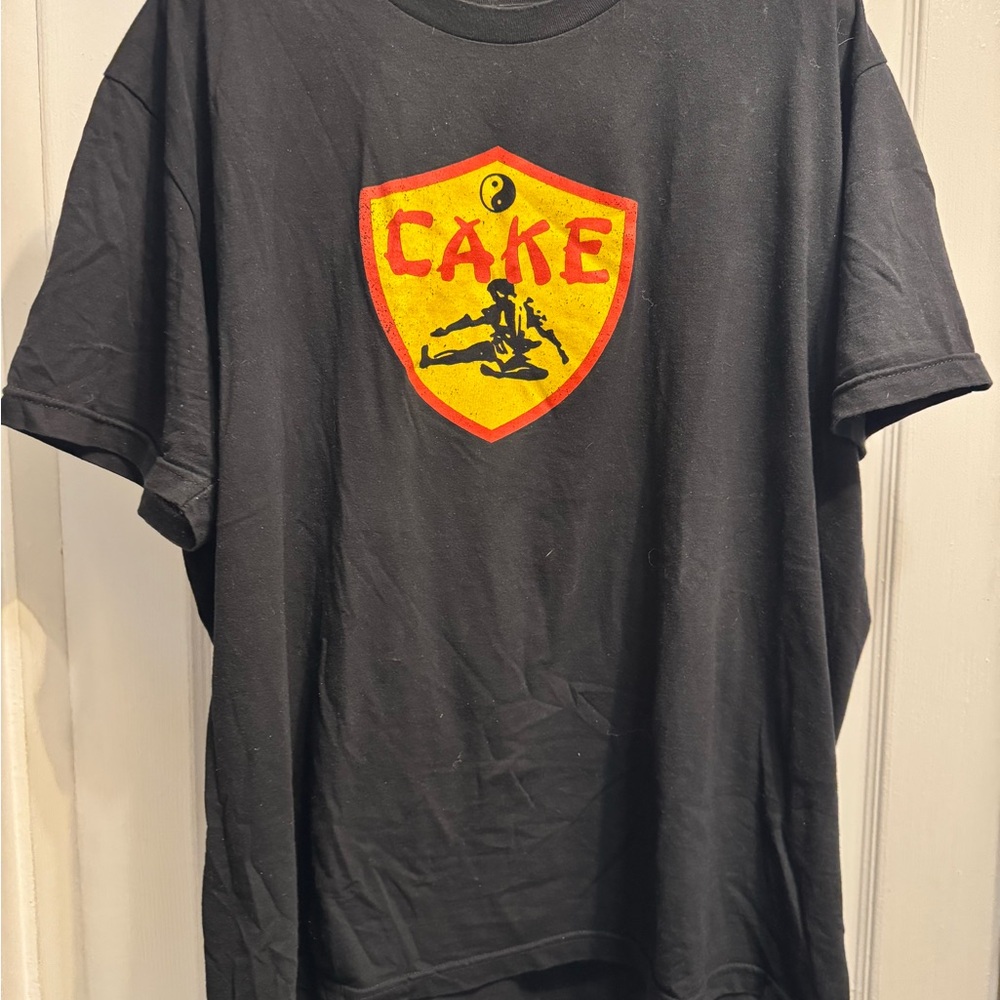 Cake Black Tee with Vibrant Logo